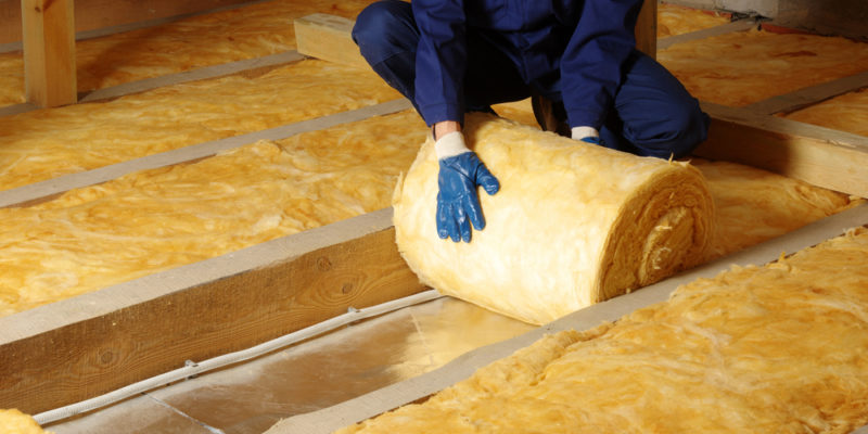 Construction,Worker,Thermally,Insulating,House,Attic,With,Glass,Wool