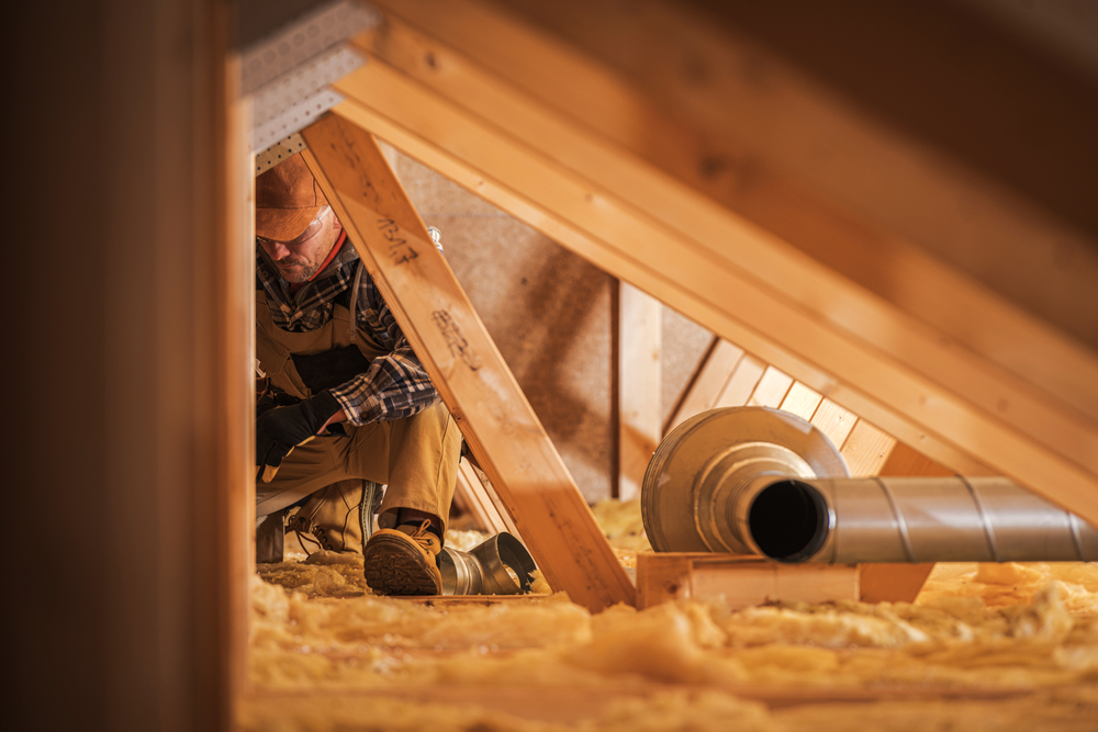 Air,ventilation,installer,working,in,attic.,air,quality,heating,and